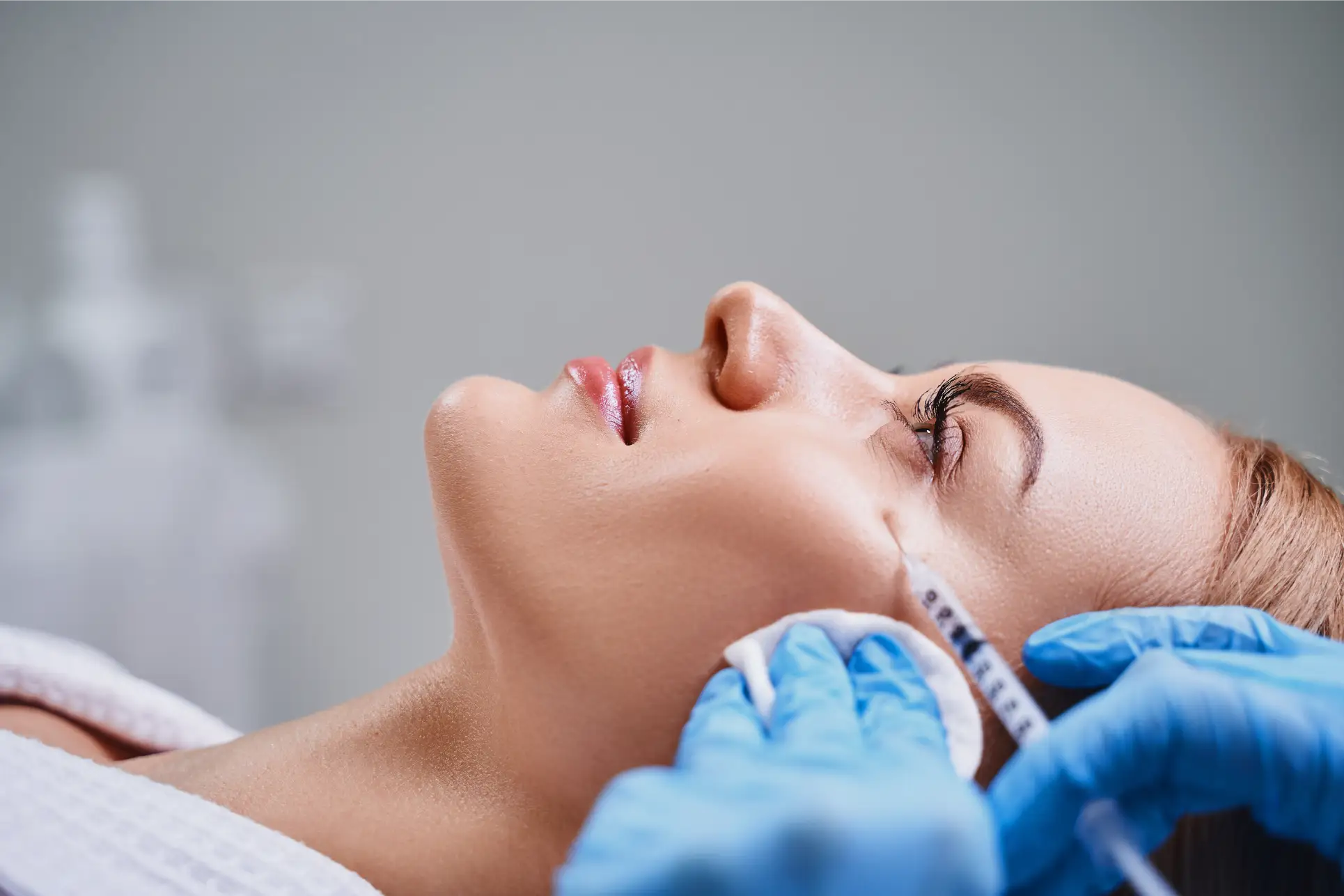 Close-up of woman undergoing PDO thread lift cosmetic procedure